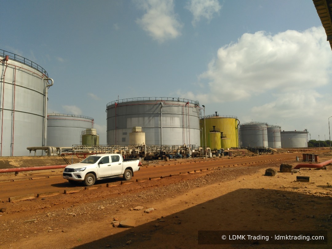 Aerial view of petroleum terminal operations at golden hour